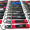 Tornari promozionali del logo personalizzato all'ingrosso Carabiners Polyester Key Chains Personalized Toryching Keychain